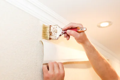 Pose de papier peint aux Ormes — revêtements muraux et toiles de verre
